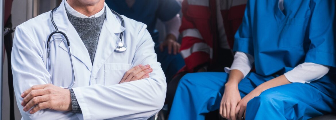 ambulance doctors working team looking at camera